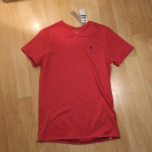 Brand new Boys Calvin Klein V-neck T-shirt (Large)